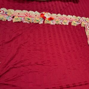 Red Embroidered Fabric with Gold Accents